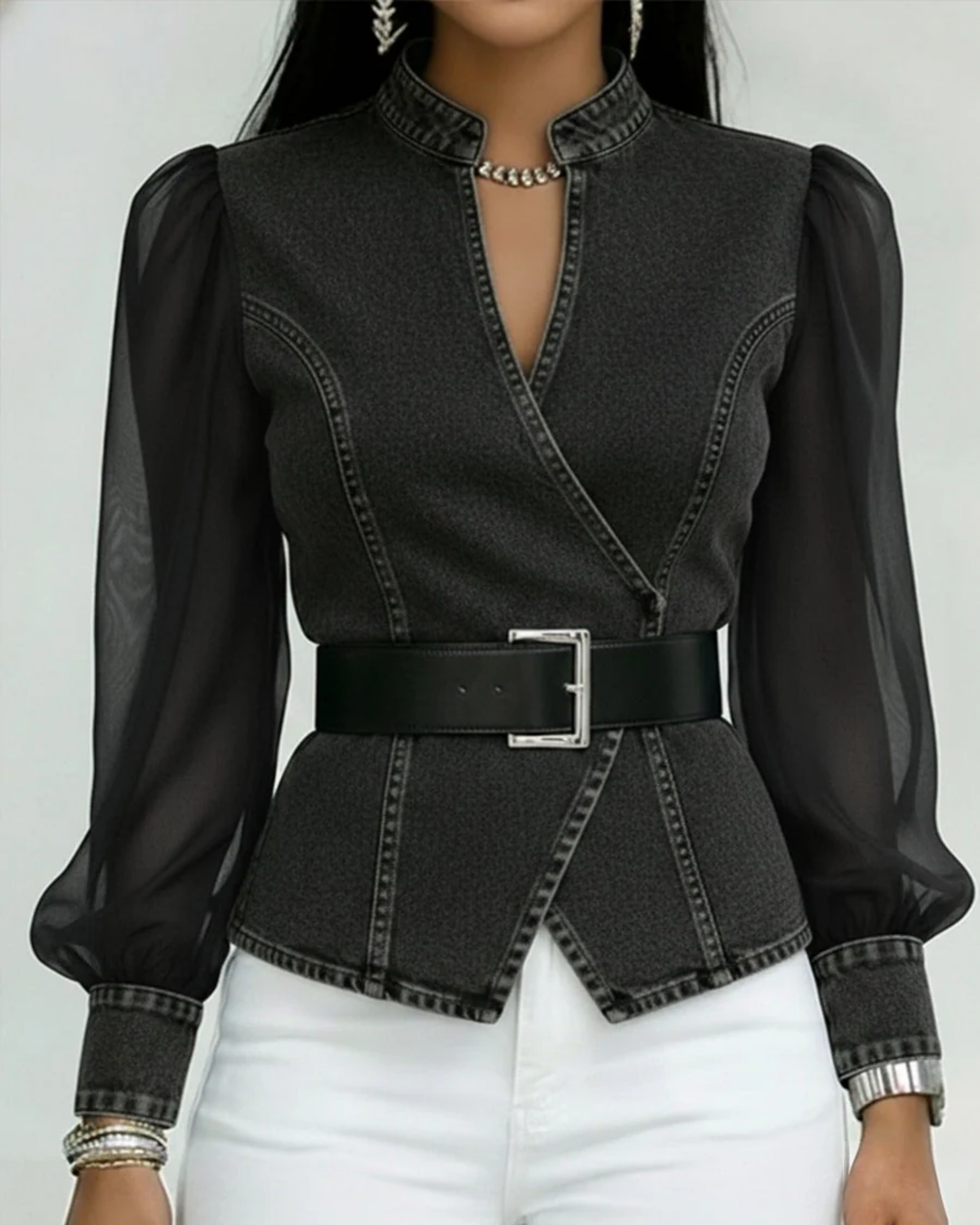 Top feminino de moda com design elegante, mangas leves e ajuste na cintura. Blusa versátil e confortável.