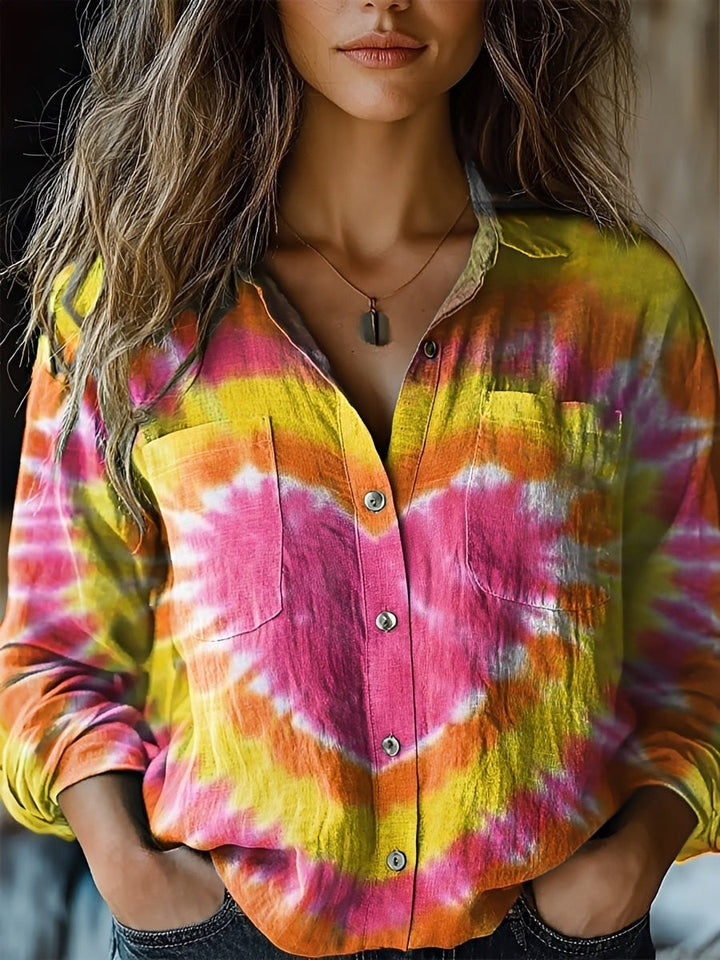 Top feminino colorido de manga longa, confortável e versátil. Um item essencial da moda casual para o dia a dia.