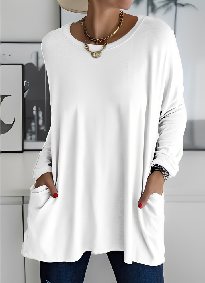 Suéter feminino solto para máximo conforto e estilo. Blusa versátil, ideal para outono e inverno.