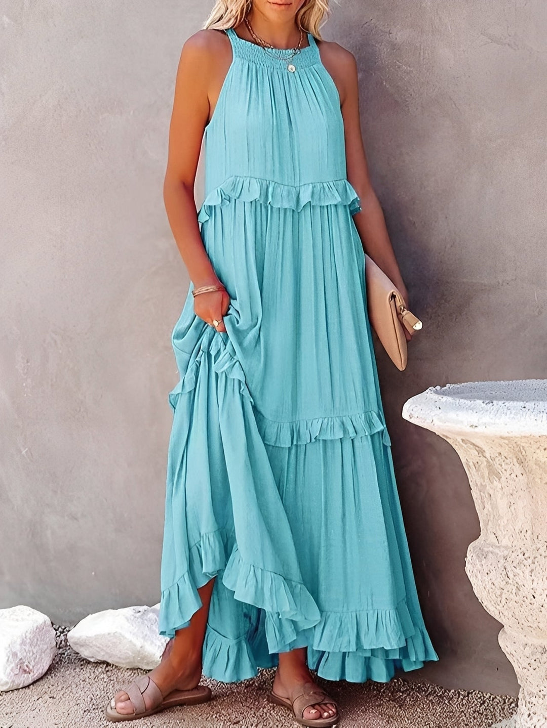 Confortável vestido midi feminino Zanna. Design sem mangas e babados para um visual moderno e elegante.