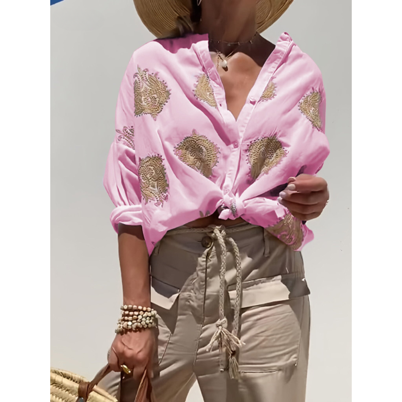 Blusa feminina colorida e versátil, adiciona um toque de estilo e vivacidade à moda do dia a dia.