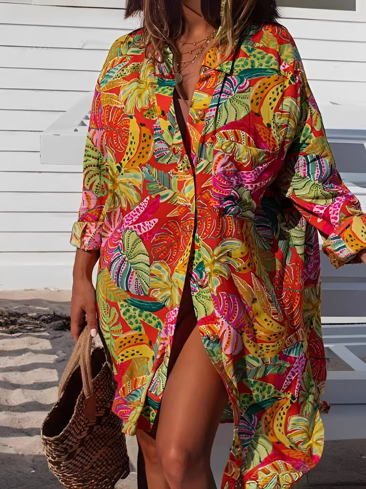 Vestido Camisa Feminino Floral Laranja midi. Ideal para verão e primavera, leve, fresco e versátil para um look casual.