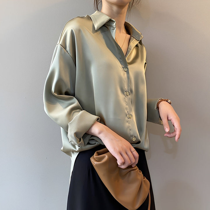 Camisa feminina de manga longa para uso diário, versátil e elegante. Essencial no guarda-roupa de roupa feminina.