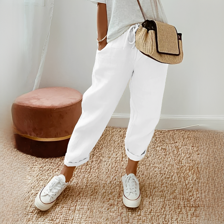 Calça feminina de pernas retas, estilo versátil e confortável, perfeita para moda casual e lazer na primavera.