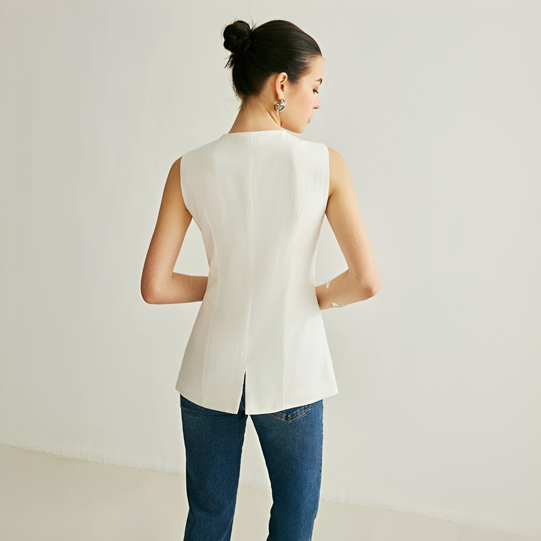 Blazer colete feminino sem mangas, ideal para um look elegante e casual na primavera e verão.