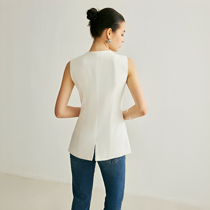 Blazer colete feminino sem mangas, ideal para um look elegante e casual na primavera e verão.