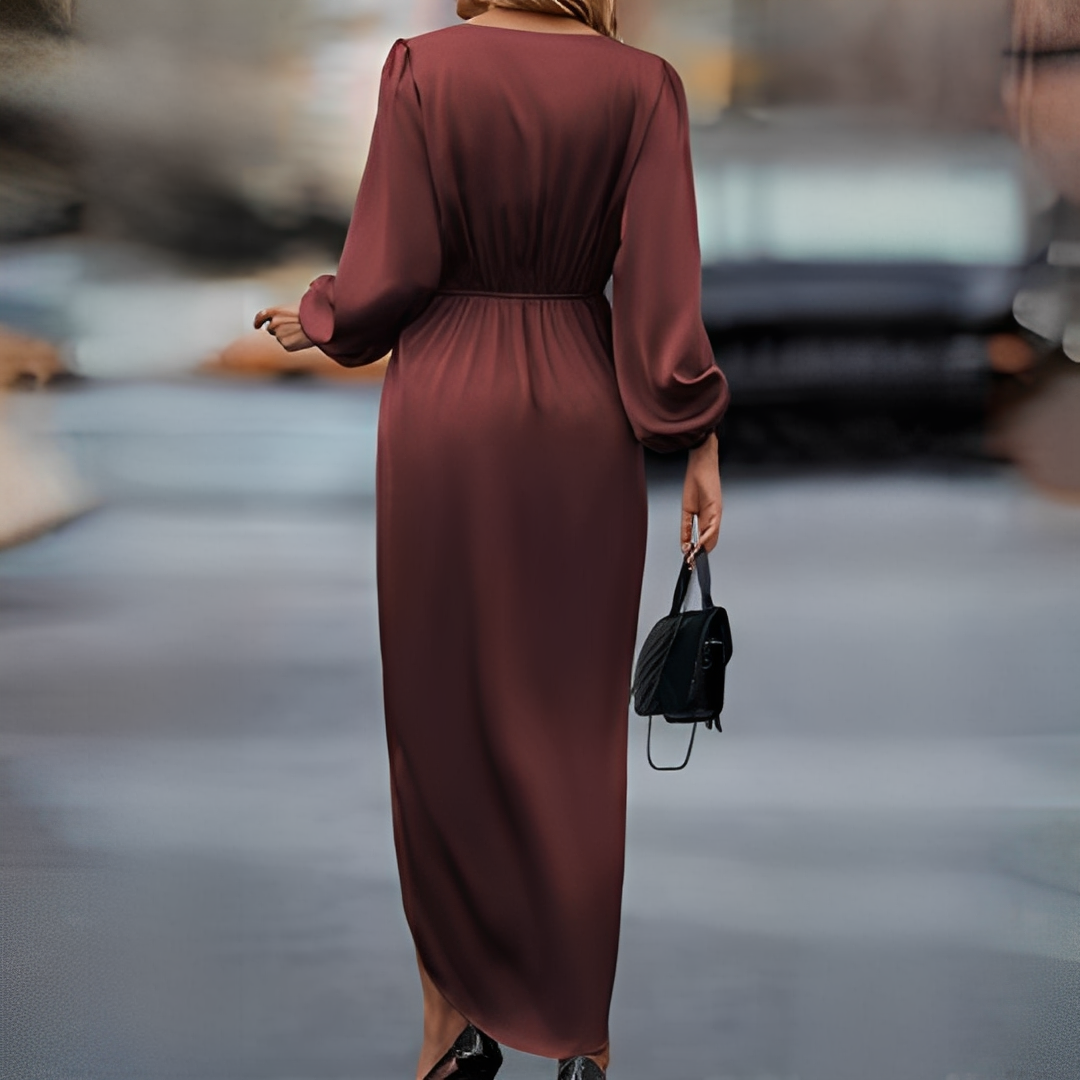 Vestido midi feminino elegante e versátil, com mangas longas e caimento impecável. Ideal para diversas ocasiões do dia a dia.