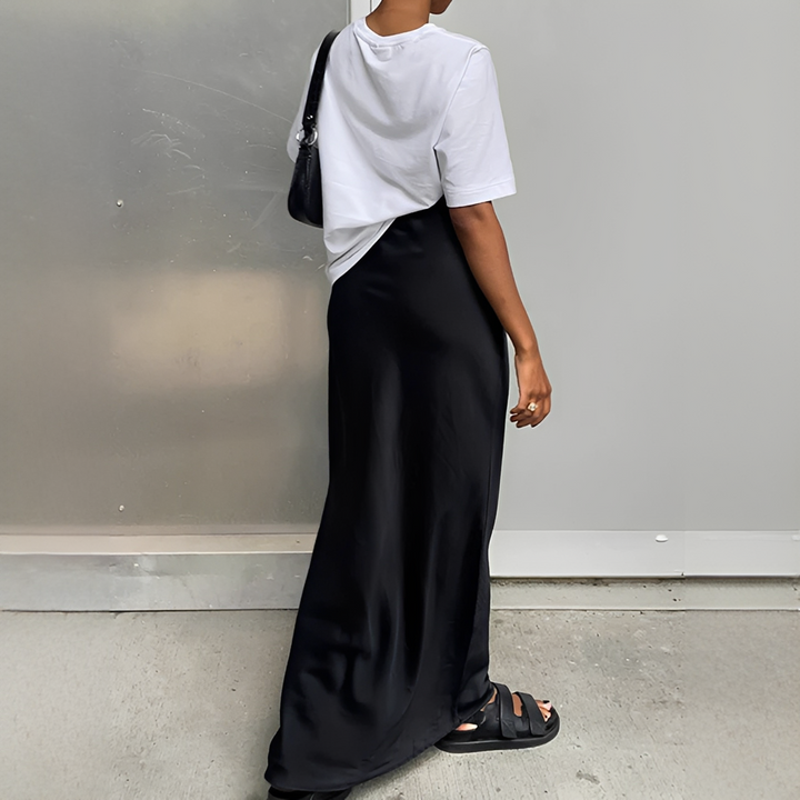 Saia longa feminina utilitária com bolsos. Estilo casual elegante, perfeita para moda verão e outono. Roupa versátil.