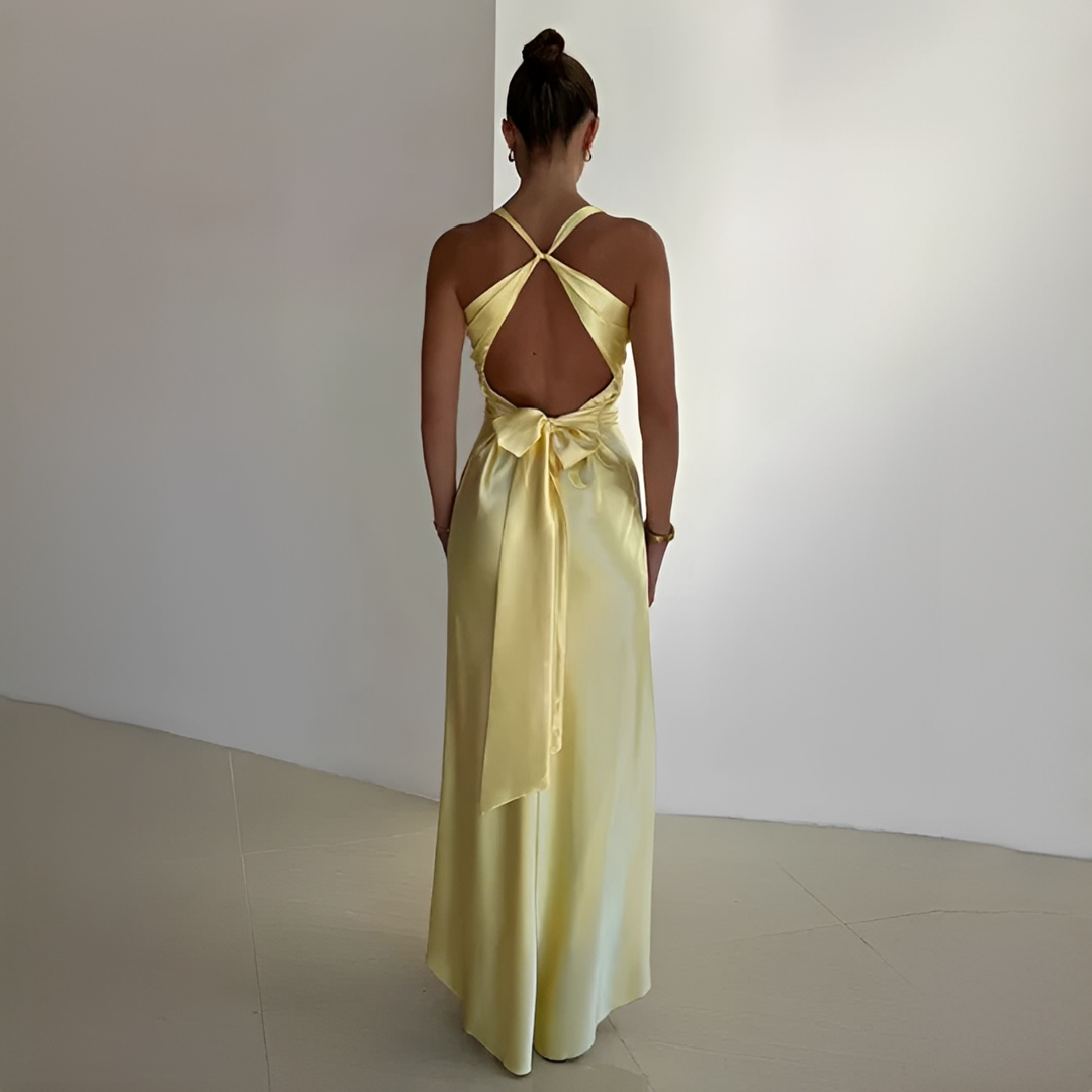 Vestido Amarelo Feminino sem Mangas, versátil e fluido. Ideal para looks casuais ou eventos elegantes de verão.