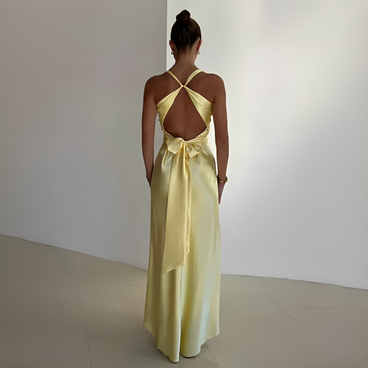 Vestido Amarelo Feminino sem Mangas, versátil e fluido. Ideal para looks casuais ou eventos elegantes de verão.