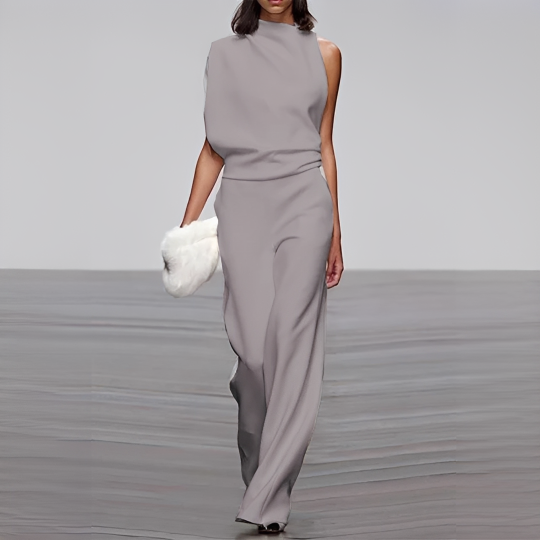 Macacão elegante feminino de pernas largas e decote redondo, promovendo um estilo moderno e confortável.