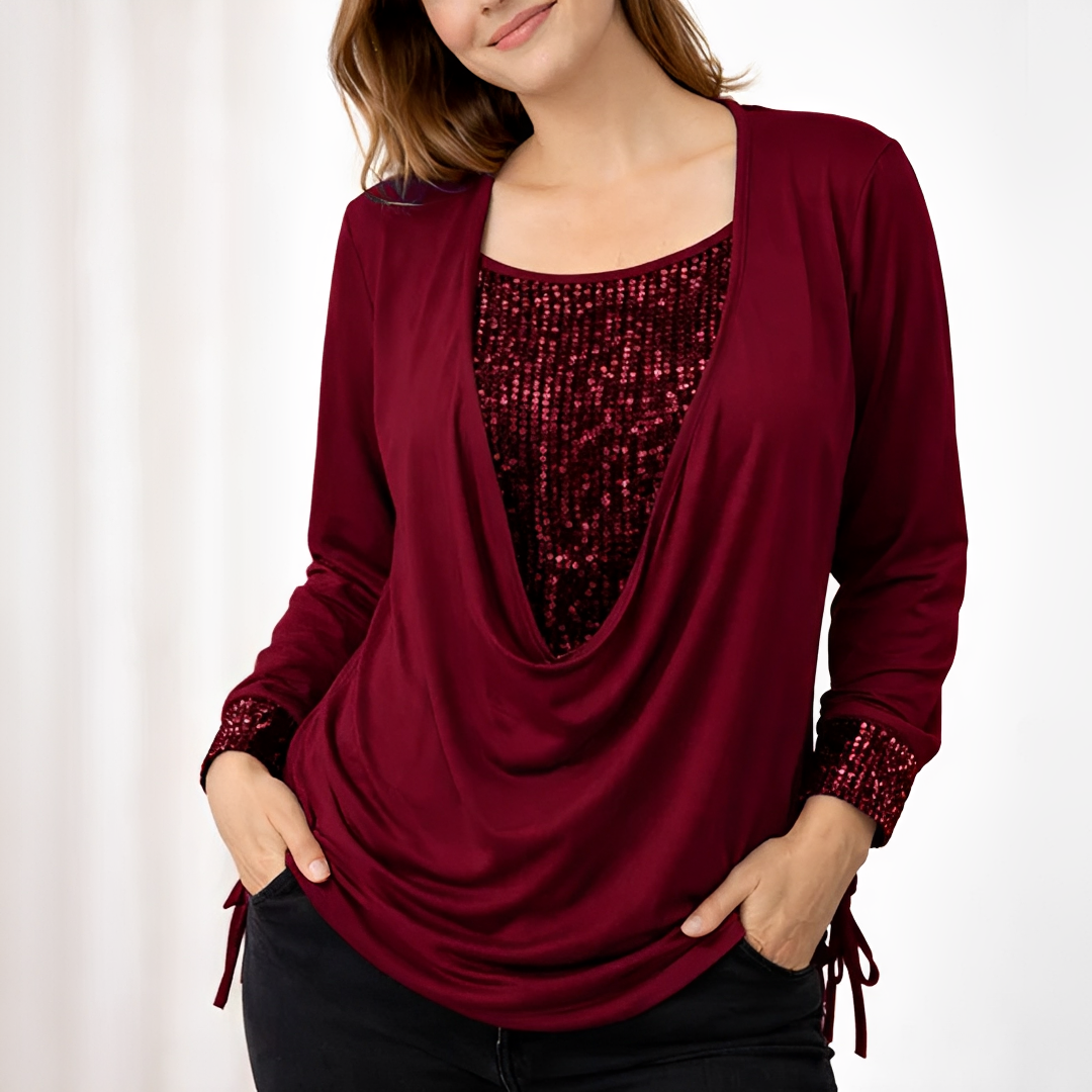 Blusa feminina versátil com mangas longas, ideal para o dia a dia e trabalho. Conforto e estilo casual elegante.