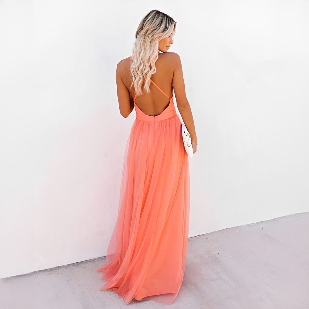 Vestido feminino maxi laranja com decote V, estilo elegante e fluido. Ótimo para eventos de verão e moda feminina casual chique.