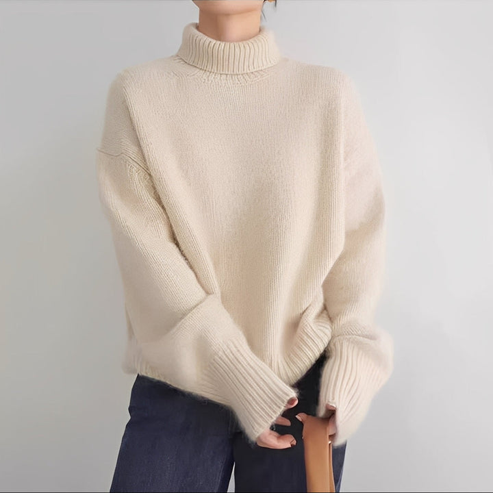 Pulôver feminino versátil para inverno. Conforto e estilo casual com gola alta.