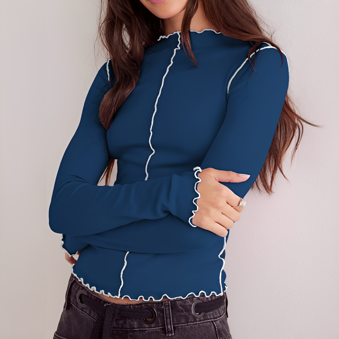Blusa feminina elegante de manga comprida com ajuste slim, perfeita para um look casual e versátil.