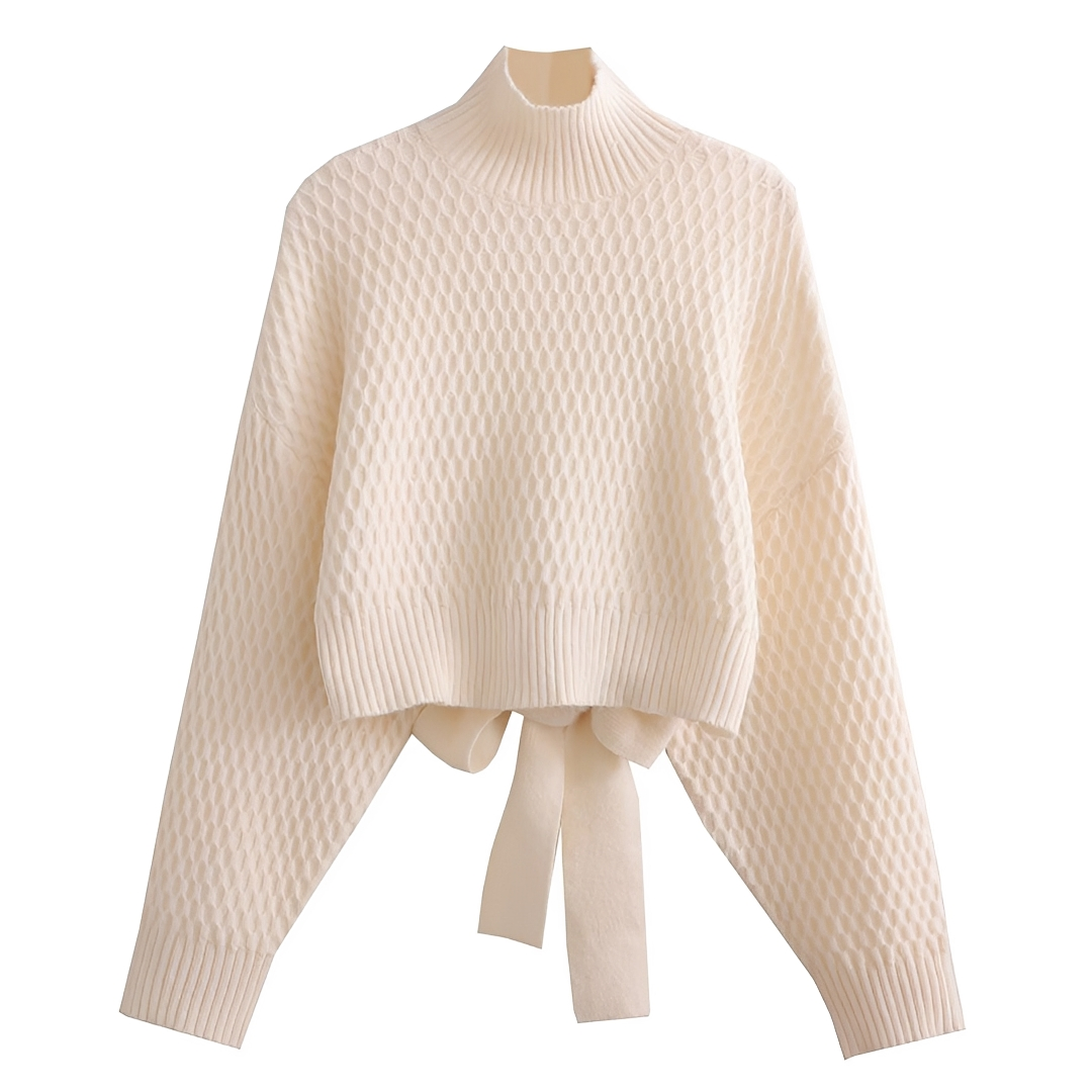 Suéter feminino bege confortável com detalhe de laço nas costas, ideal para a moda inverno e estilo elegante.