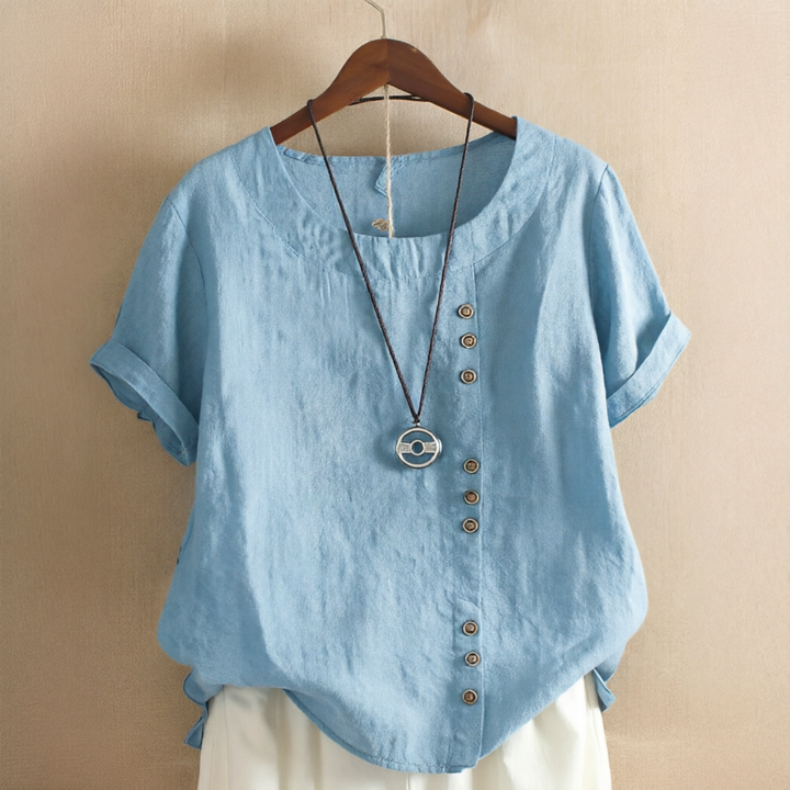 Camisa feminina Noelle, moda verão, caimento solto para conforto e estilo. Cores variadas disponíveis.