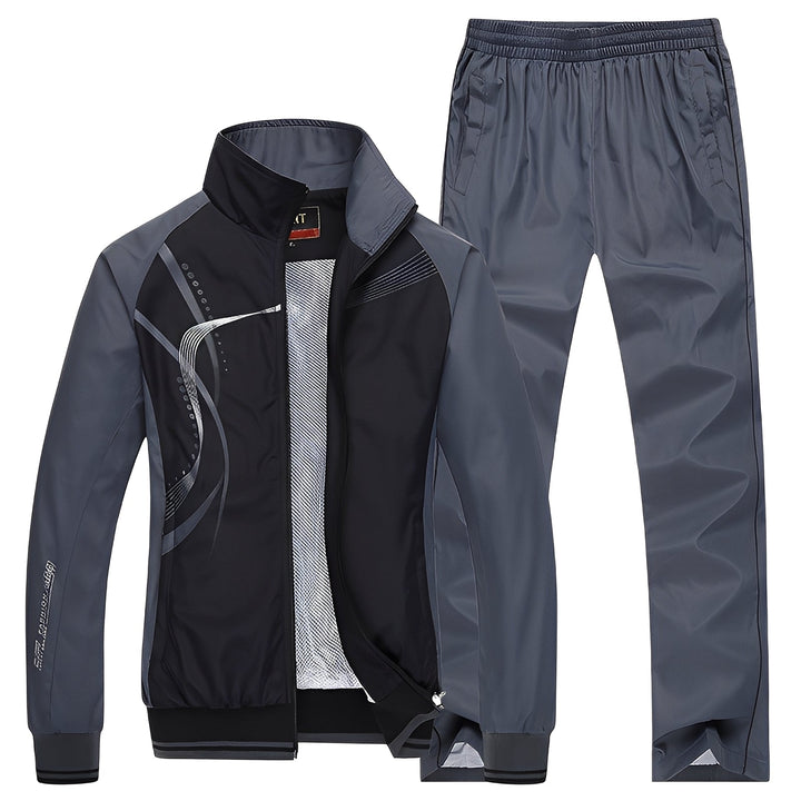 Conjunto de jaqueta e calça masculino para treino ou lazer, combinando conforto e moda homem.