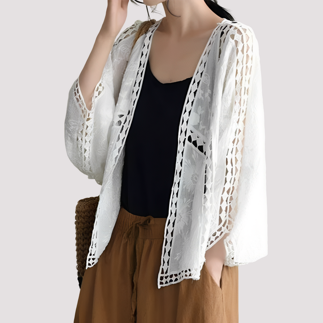 Cardigã feminino moderno com recortes elegantes, perfeito para a moda outono e estilo casual com conforto.