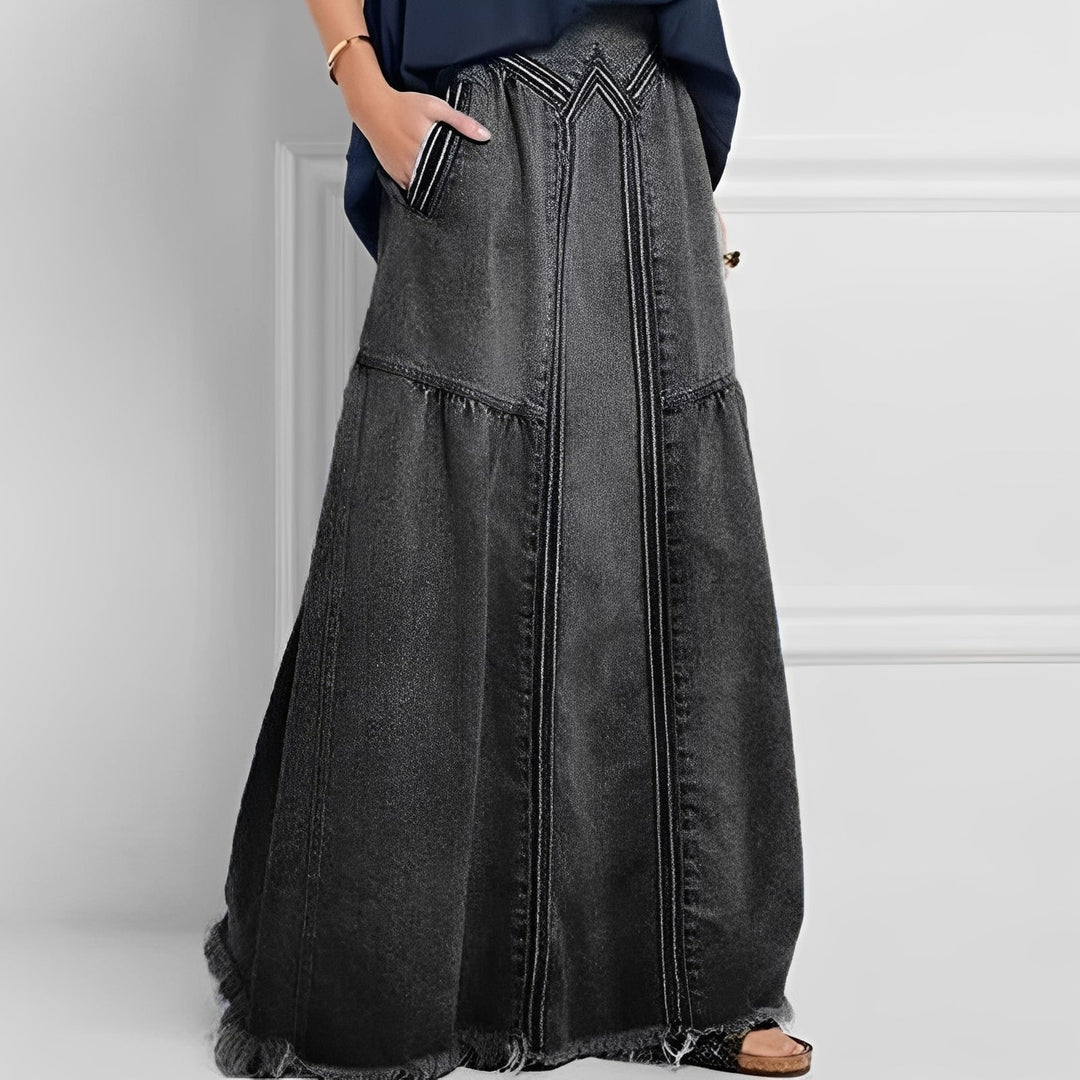 Saia jeans feminina azul-marinho com bolso, design elegante e versátil para mulheres. Conforto e estilo casual.