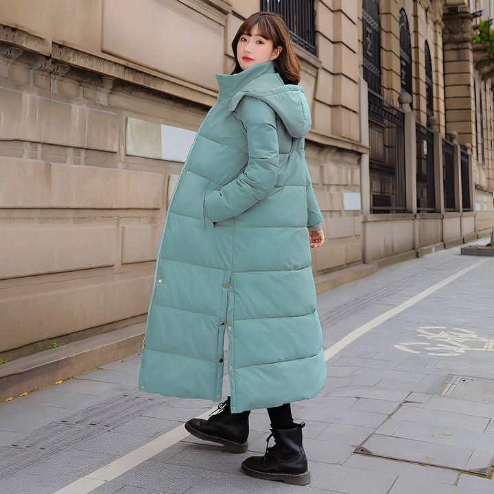 Casaco feminino acolchoado longo e quente para inverno. Proteção feminina contra o frio com estilo e conforto.