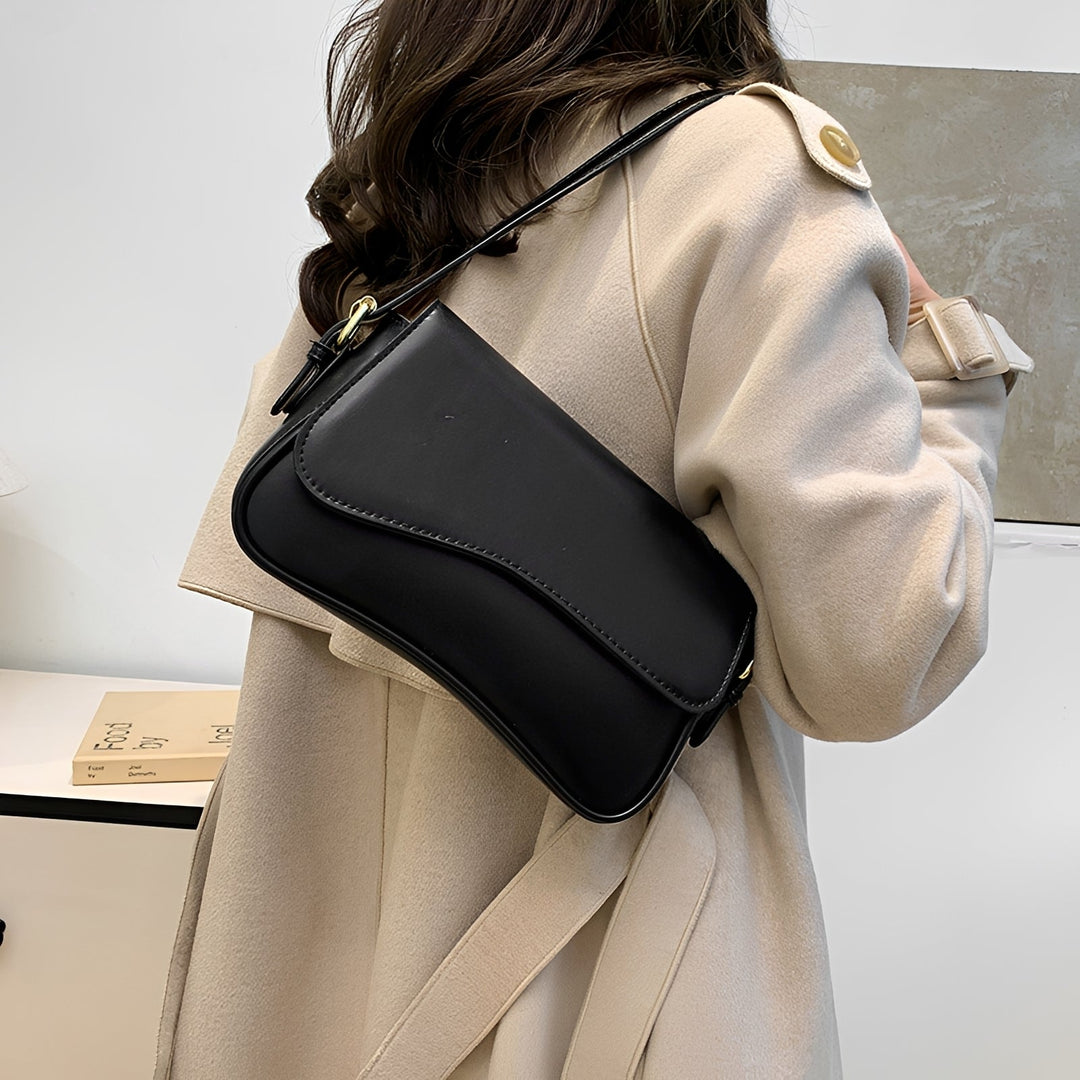 Bolsa feminina de ombro versátil para moda dia a dia, acessório elegante e prático para mulheres.