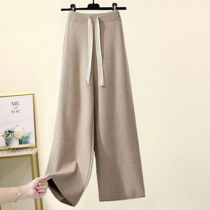 Conjunto feminino de duas peças versátil, manga longa e caimento folgado, perfeito para conforto e elegância casual.