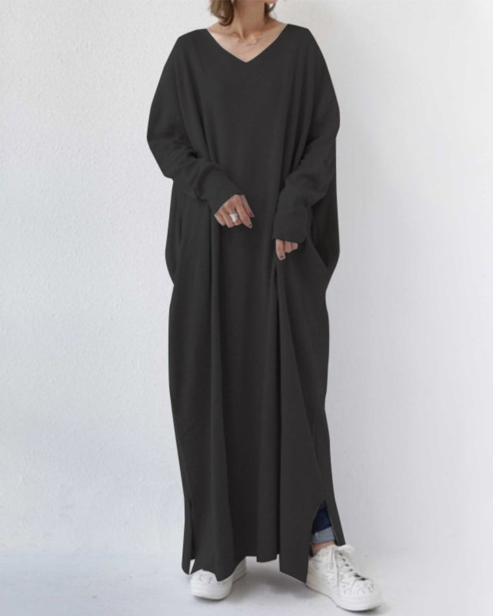 Vestido longo feminino de festa para inverno, elegante, com mangas compridas e caimento impecável. Moda feminina.