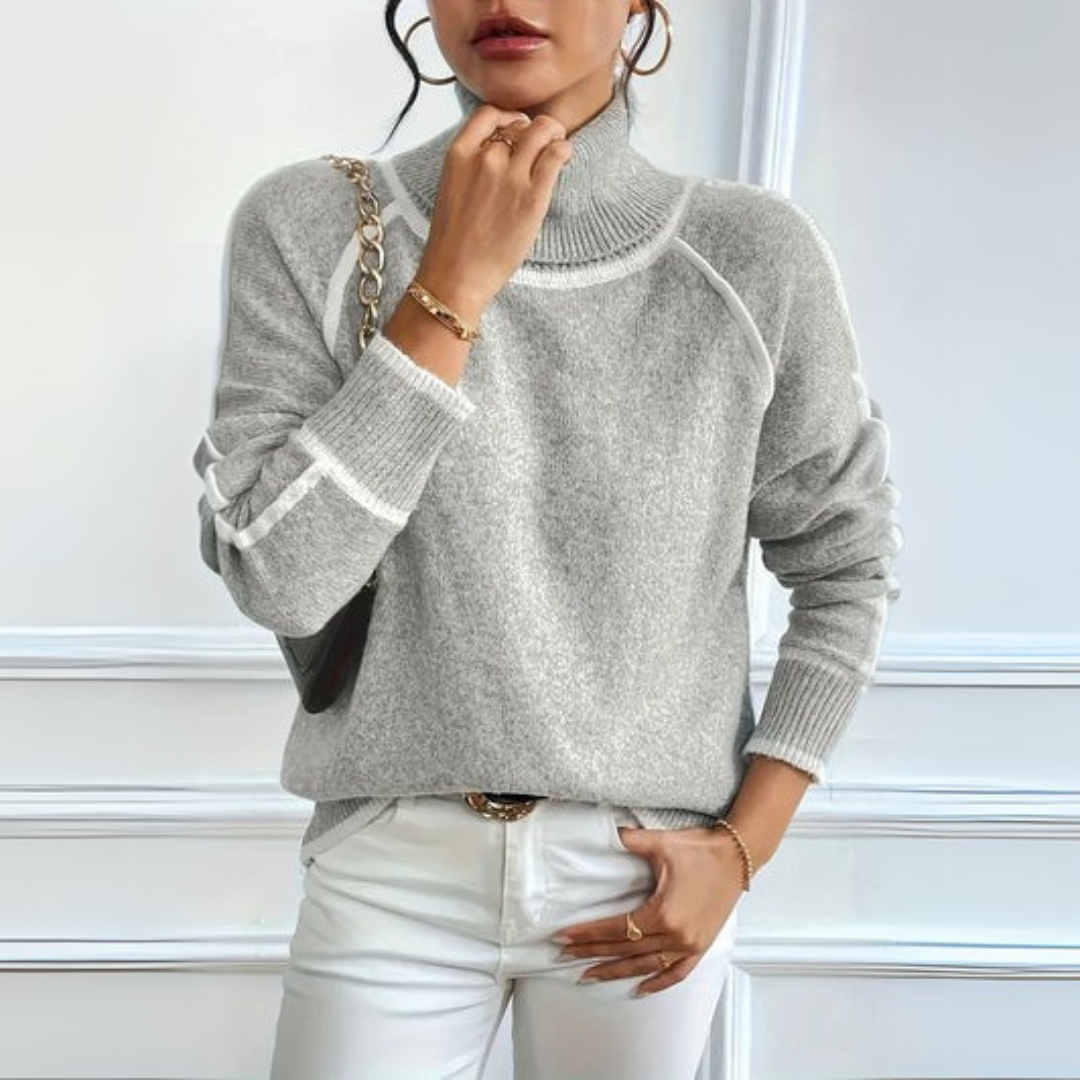 Suéter feminino casual de gola alta. Malha macia e confortável, ideal para looks de inverno elegantes.