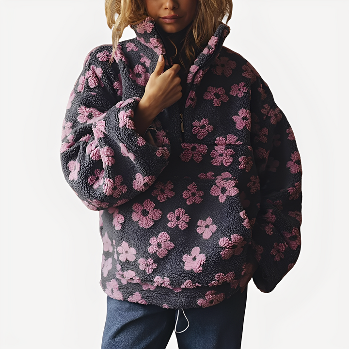 Pulôver feminino sherpa floral com detalhes elegantes. Aconchegante e moderno, ideal para o inverno casual.