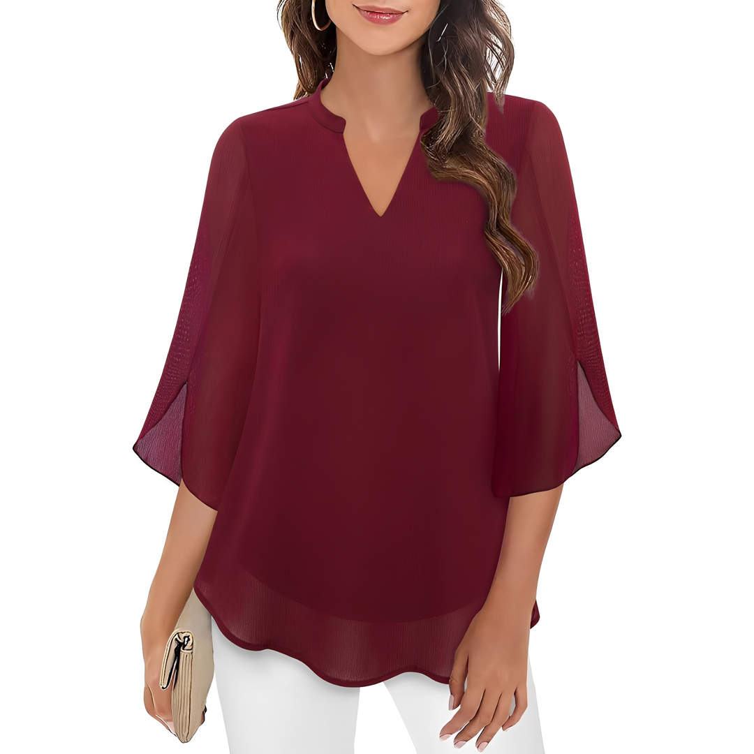 Blusa feminina de verão, solta e com decote V. Proporciona conforto e estilo casual para dias quentes.