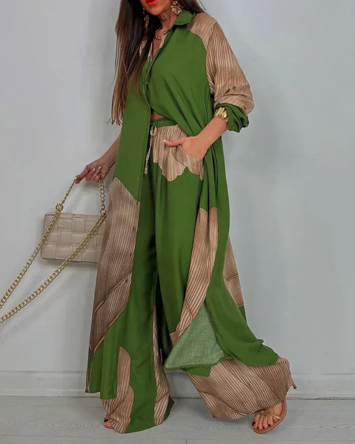Conjunto feminino elegante com estampa vibrante, blusa fluida e calça pantalona confortável para verão.