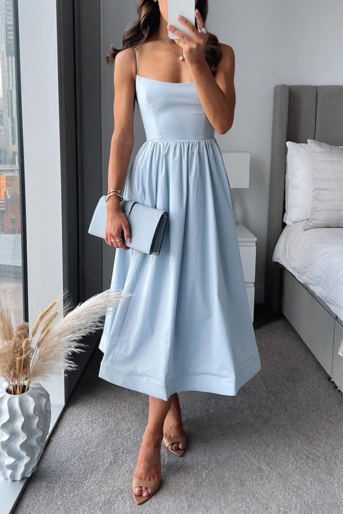 Vestido midi feminino casual com corte flare, alças finas e cores vibrantes, ideal para moda verão com conforto.