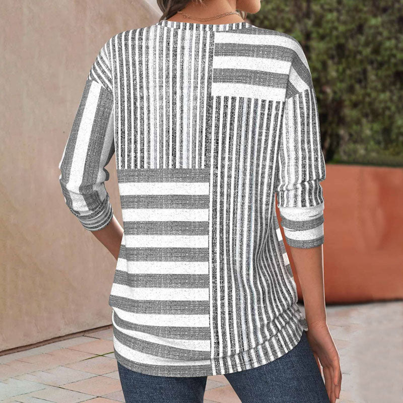 Blusa feminina listrada fluida e leve, proporcionando conforto e um caimento elegante. Perfeita para o dia a dia.