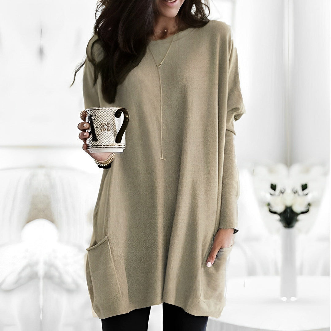 Blusa feminina sofisticada de manga longa, ideal para o outono e inverno.