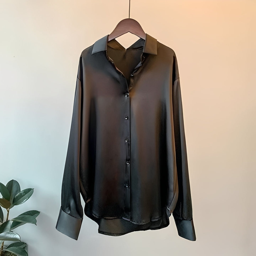 Blusa feminina elegante de manga longa, ideal como camisa social para escritório ou para um estilo casual chique e versátil.