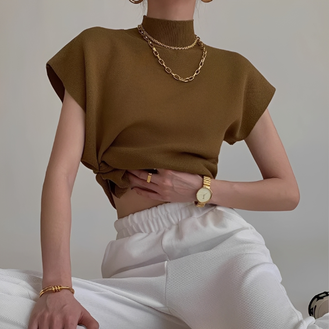 Blusa feminina gola alta para trabalho ou casual. Roupa confortável e elegante, perfeita para moda outono.