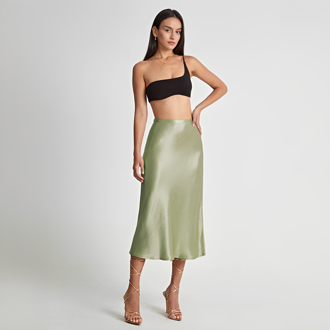 Saia midi fluida feminina de cintura alta elegante, perfeita para um look confortável e sofisticado.