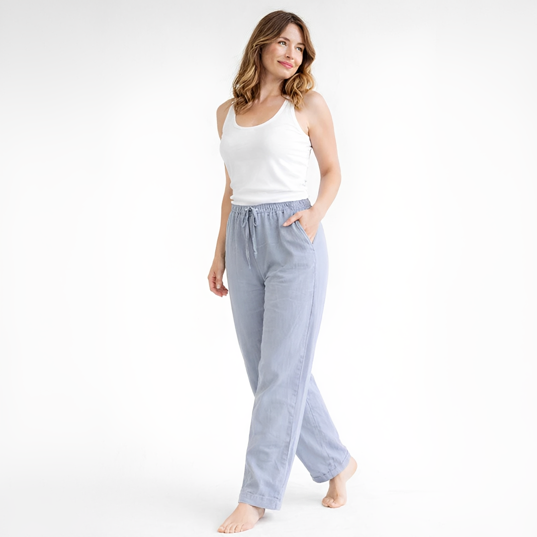 Calça feminina larga de verão, tecido fresco, ideal para conforto e moda casual na estação quente.