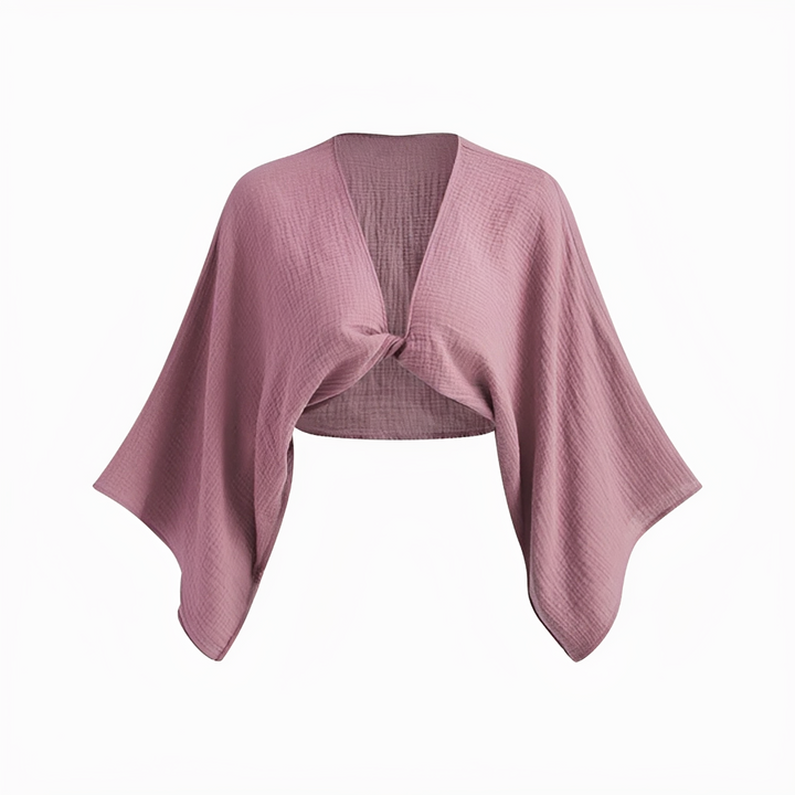 Blusa feminina roxa da moda, com laço frontal charmoso. Peça estilosa para looks elegantes e casuais.