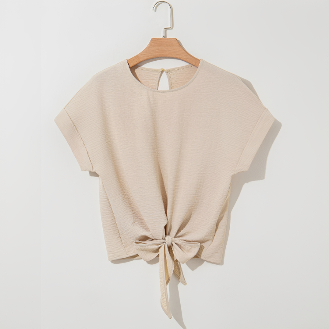 Top feminino bege, manga curta, estilo casual para o verão. Blusa confortável e versátil para o dia a dia.