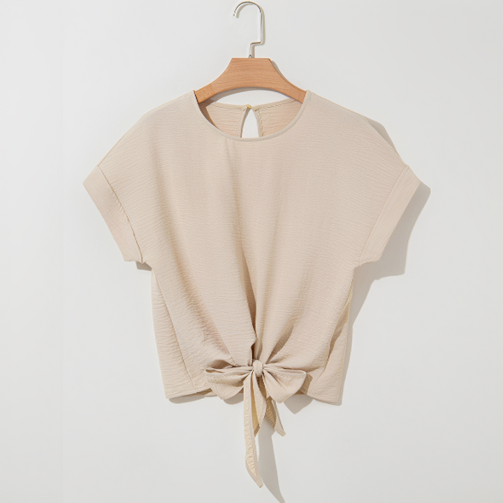Top feminino bege, manga curta, estilo casual para o verão. Blusa confortável e versátil para o dia a dia.