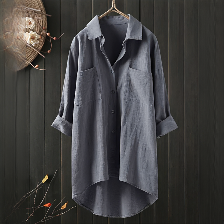 Blusa feminina oversized confortável, ideal para primavera/verão. Tecido leve, design casual e versátil.