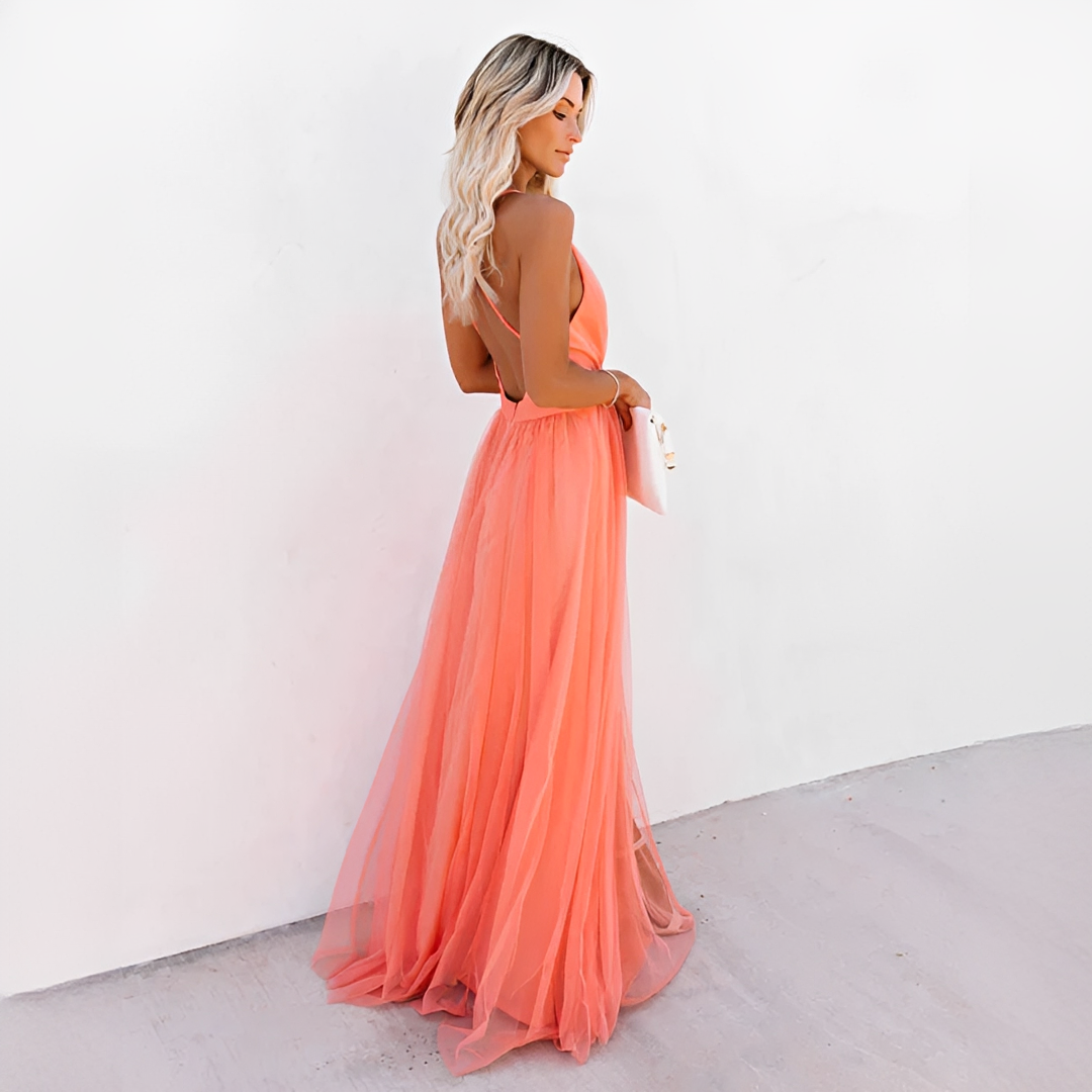Vestido feminino de verão maxi laranja elegante, com tecido fluido e decote V. Conforto e estilo para festas e ocasiões especiais.
