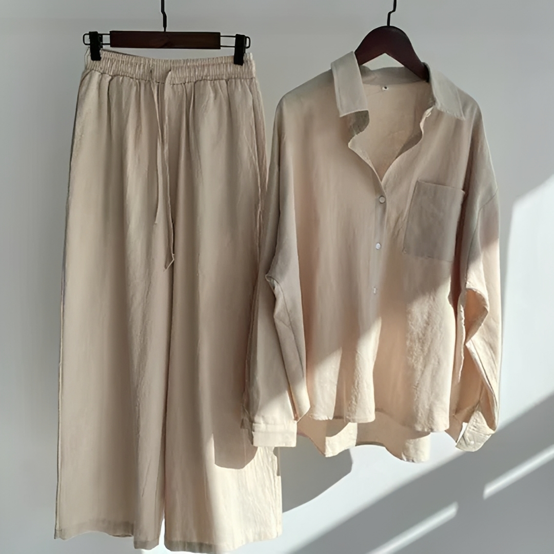 Conjunto feminino de 2 peças com calças soltas e blusa, ideal para verão e conforto casual.