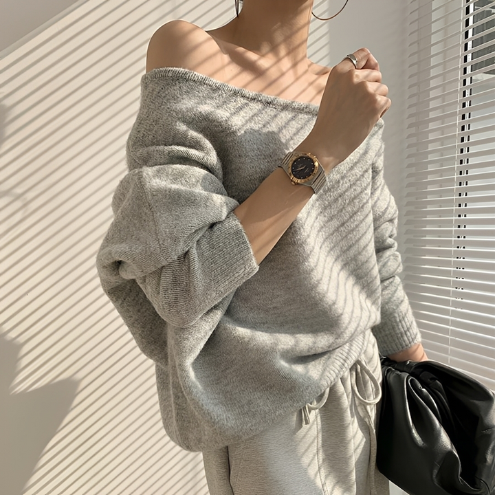 Blusa feminina chic assimétrica ombro a ombro, perfeita para moda verão. Top moderno e confortável.