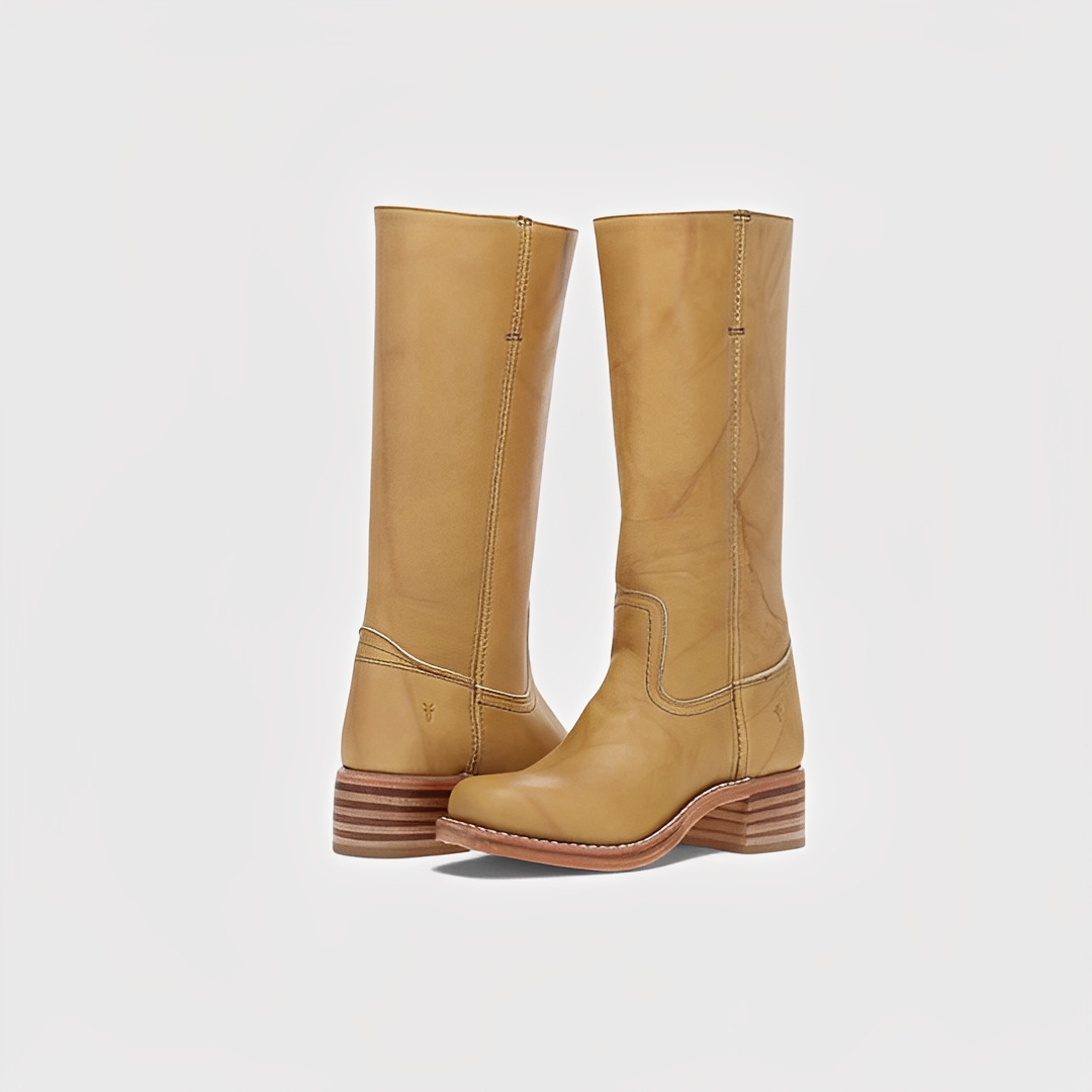 Botas femininas pretas de salto alto. Calçado elegante e versátil para o inverno, com conforto ao joelho.