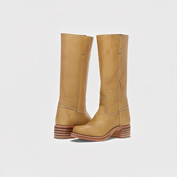 Botas femininas pretas de salto alto. Calçado elegante e versátil para o inverno, com conforto ao joelho.