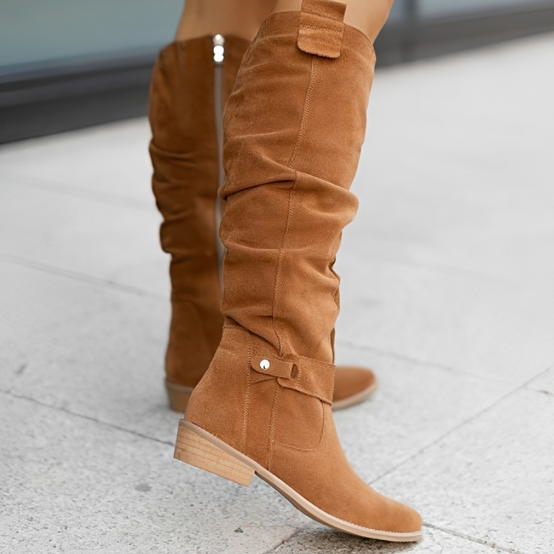 Botas femininas elegantes e quentinhas para o inverno, com design moderno e conforto térmico, ideais para o frio.