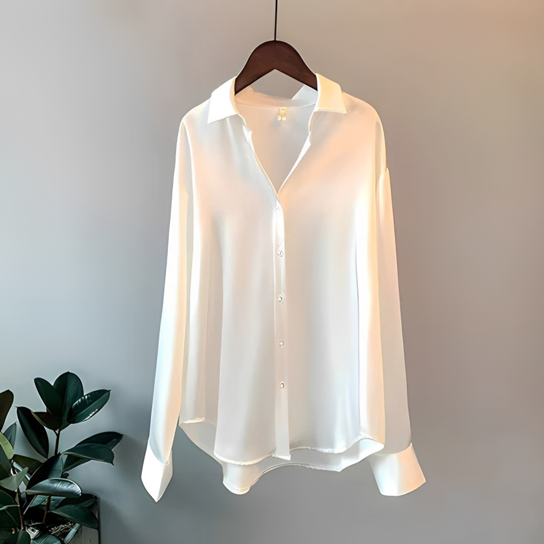 Camisa feminina elegante de manga longa brilhante, ideal para looks sociais ou casuais da moda primavera/verão.